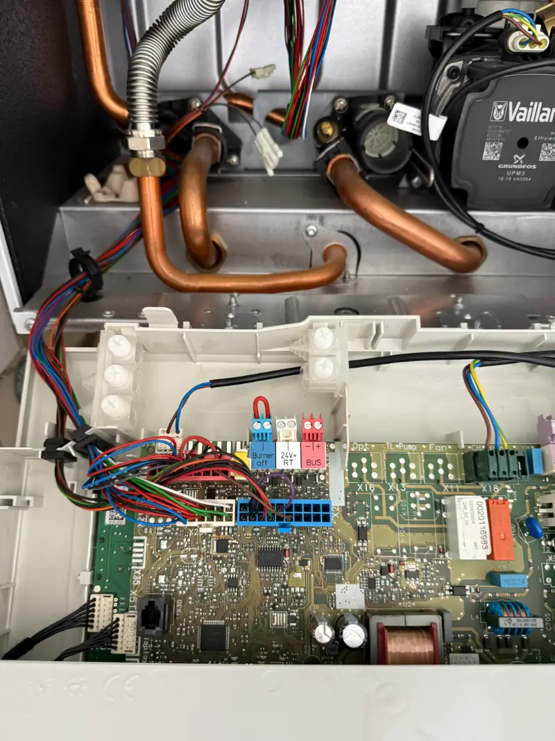 Control board and wiring inside a boiler opened up for fault finding