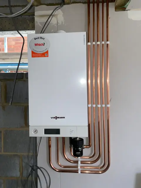 Viessmann boiler installed with new copper pipework and a magnetic filter by Homely Heating Group